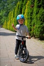 Child on a bike wearing helmet