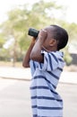 Child and binoculars. Royalty Free Stock Photo