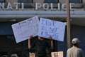 Child at BLM rally with protest signs