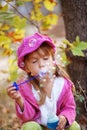 Child blowing bubbles Royalty Free Stock Photo