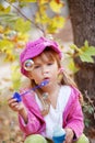 Child blowing bubbles Royalty Free Stock Photo