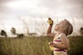 Child blowing bubbles