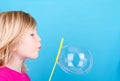 Child blowing bubbles Royalty Free Stock Photo