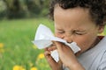 Child blowing nose Royalty Free Stock Photo