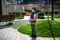 Child blowing a soap bubbles. Boy playing. Kid blowing bubbles on nature. Baby at sunset, the sun\'s rays Royalty Free Stock Photo