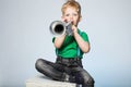 Child Blowing Trumpet Royalty Free Stock Photo