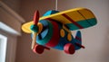 Child blue propeller toy airplane spinning indoors generated by AI Royalty Free Stock Photo