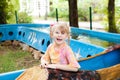 Child in the boat in the park Royalty Free Stock Photo