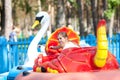 Child in the boat - swan rides in the park Royalty Free Stock Photo
