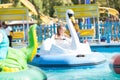 Child in the boat - swan rides in the park Royalty Free Stock Photo