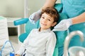 Child boy in the dental office smiling
