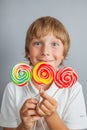 Child boy eating lollipop Royalty Free Stock Photo