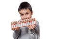 Child boy with Japanese traditional abacus soroban isolated on white background with clipping path