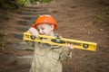 Child Boy with Level Playing Handyman Outside