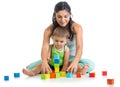 Child boy and mother play together with block toys Royalty Free Stock Photo