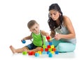 Child boy and mother playing together with block toys Royalty Free Stock Photo