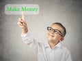 Child boy pressing make money button on touchscreen Royalty Free Stock Photo