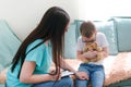 Child boy in the psychologists office. Psychologist talking to a child Royalty Free Stock Photo