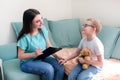 Child boy in the psychologists office. Psychologist talking to a child Royalty Free Stock Photo