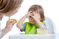 Child boy refuses to eat closing face by hands Royalty Free Stock Photo