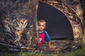 Child boy resting in camping tent in countryside summer camp concept childhood camping countryside lifestyle