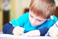 Child boy studying writing Royalty Free Stock Photo