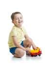 Child with toy isolated on a white background Royalty Free Stock Photo