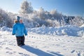 Child the boy on walk in the winter in park Royalty Free Stock Photo