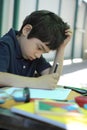 Child boy work hard doing his homework Royalty Free Stock Photo