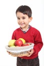 Child bring basket fruit