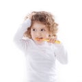 The child brushing her teeth isolated