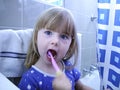 Child Brushing Teeth