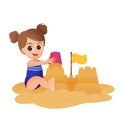 Child builds a sand castle on the beach Royalty Free Stock Photo