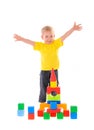 Child builds town of colored cubes