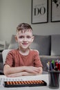 Child calculates an arithmetic problem orally. Mental arithmetic. Portrait of a boy doing mathematics Royalty Free Stock Photo