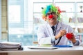 The child cardiologist with stethoscope and red heart Royalty Free Stock Photo