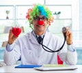 Child cardiologist with stethoscope and red heart Royalty Free Stock Photo