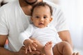 Child Care. Closeup Of Cute Little Black Infant Baby In Father& x27;s Hands Royalty Free Stock Photo