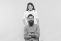 Because of child care matters. Happy child and father yellow background. Little child and bearded man. Family relations Royalty Free Stock Photo