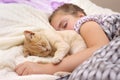 Sleeping girl witch cat Royalty Free Stock Photo