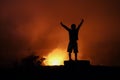 Child celebrates achievement of reaching the crater rim of KÃÂ«lauea overlook at Volcanoes National Park, Hawaii Big Island.