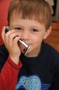 Child with cell phone Royalty Free Stock Photo