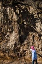 Child checking root system - soil erosion