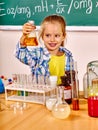 Child in chemistry class
