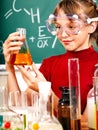 Child in chemistry class. Royalty Free Stock Photo