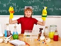 Child in chemistry class. Royalty Free Stock Photo