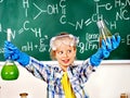 Child in chemistry class. Royalty Free Stock Photo