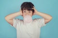 Child with chewing gum in your mouth Royalty Free Stock Photo