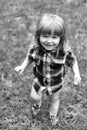 Child Childhood Children Happiness Concept. happy small boy on green grass Royalty Free Stock Photo