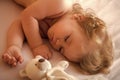 Child Childhood Children Happiness Concept. Sleeping boy with toy